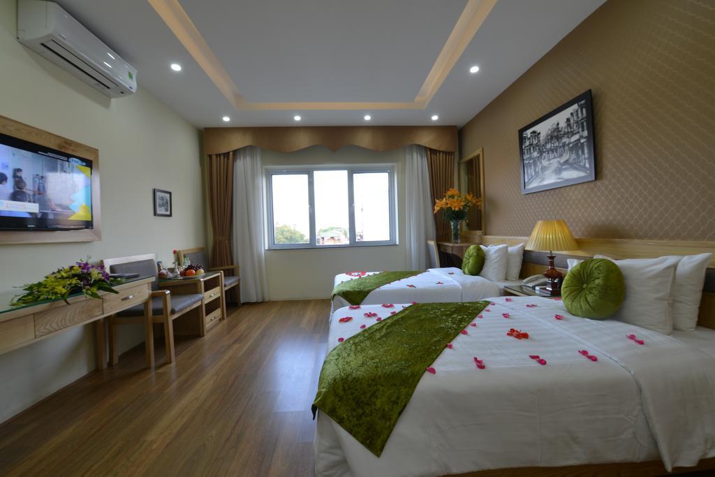 Blue Hanoi Inn Hotel Room photo