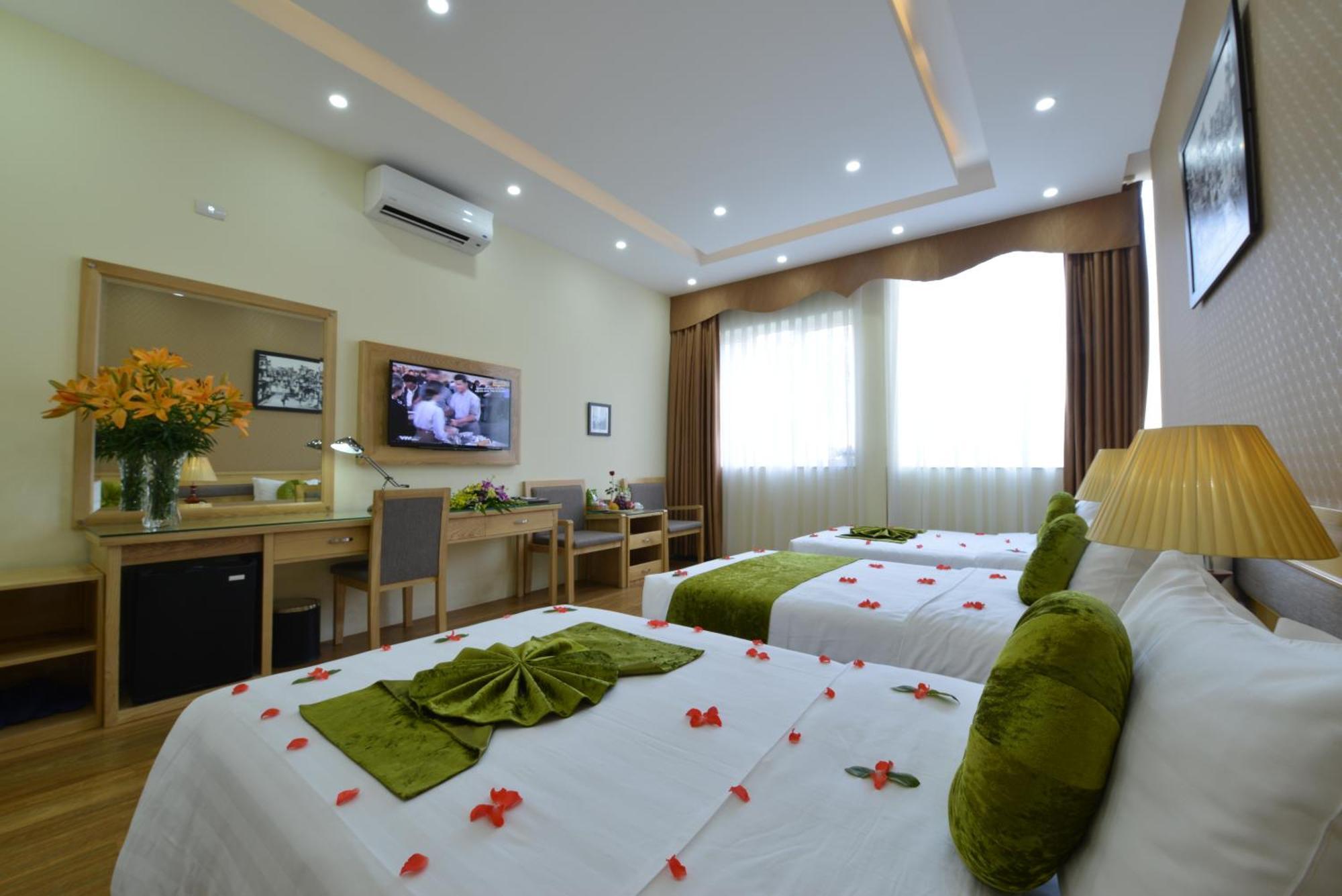 Blue Hanoi Inn Hotel Room photo