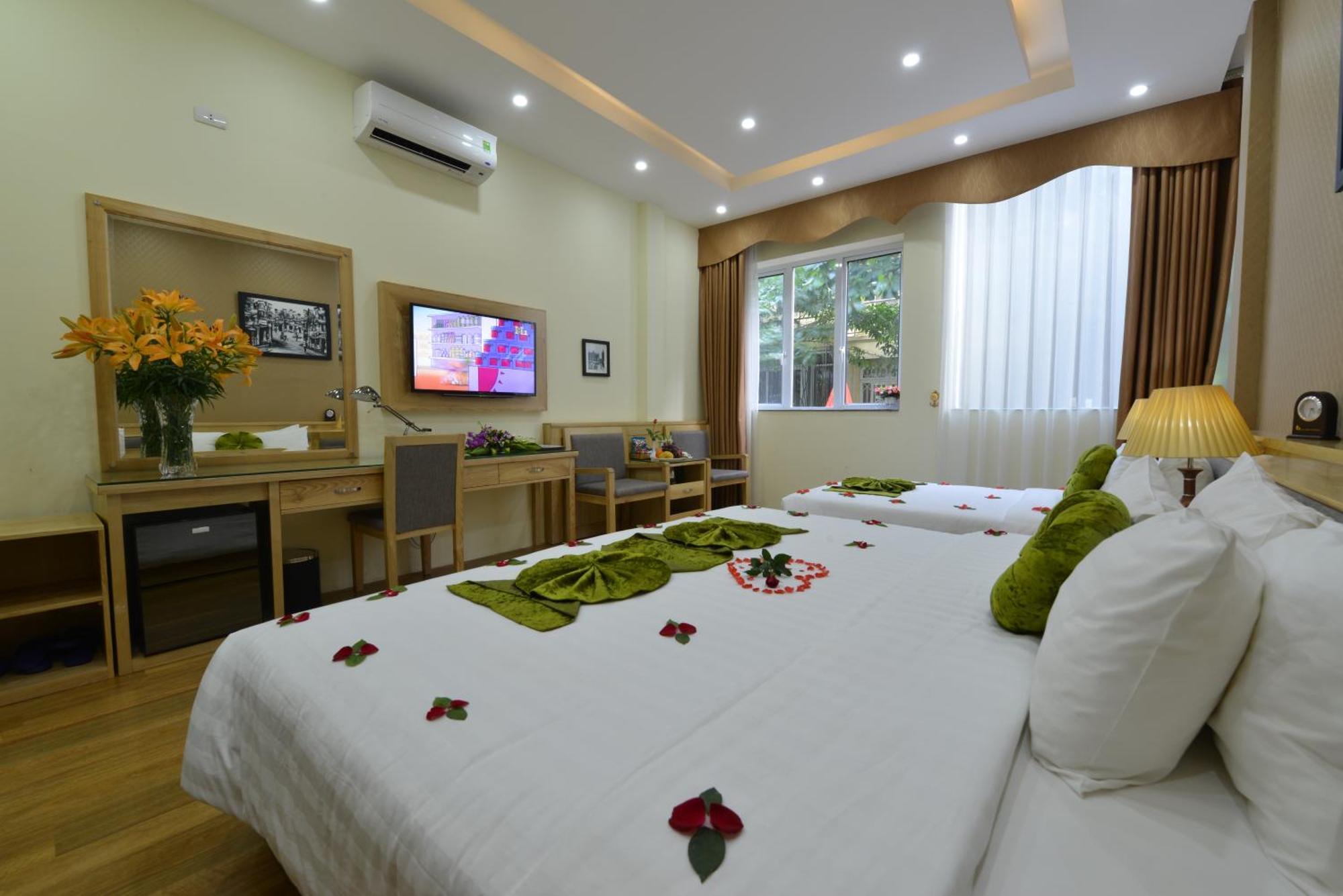 Blue Hanoi Inn Hotel Room photo