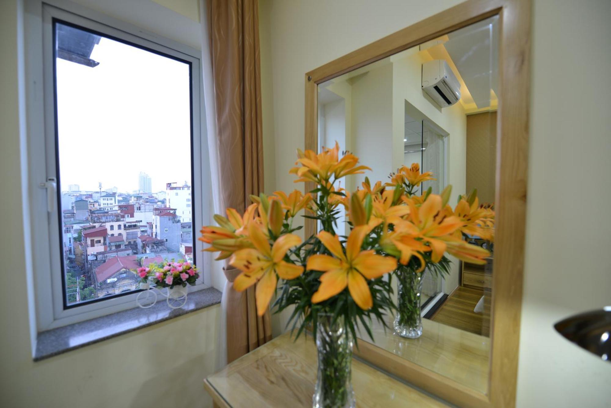 Blue Hanoi Inn Hotel Room photo